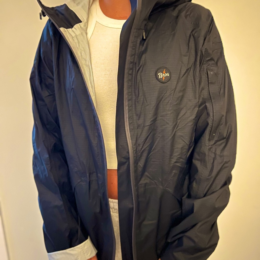 Rand new Howler Brothers black rain jacket
